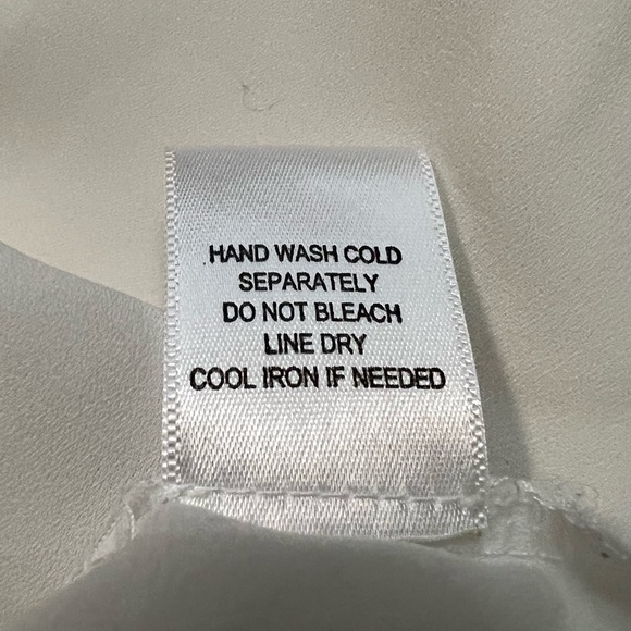 White, v-neck, Pleione top. Relaxed fit, tunic length with adjustable sleeves. - Picture 7 of 9